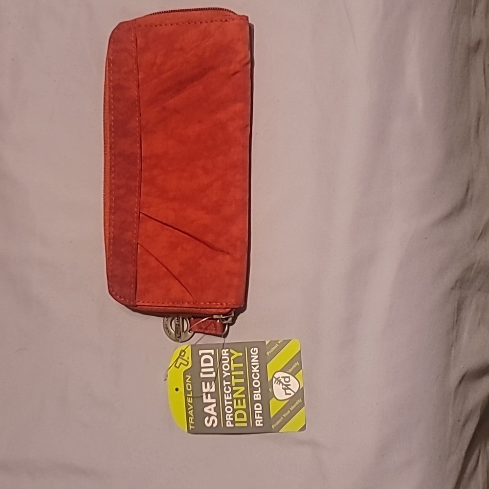 Red Travelon Wallet. NEW